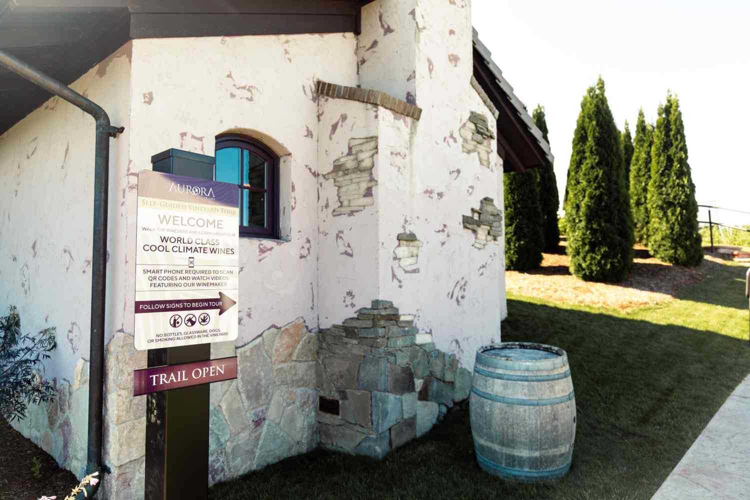 Visitors strolling through a self-guided wine tour at Aurora Cellars, Lake Leelanau, MI