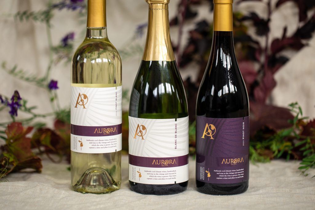 Three kinds of wine bottles from Aurora Cellars are available in Lake Leelanau, MI